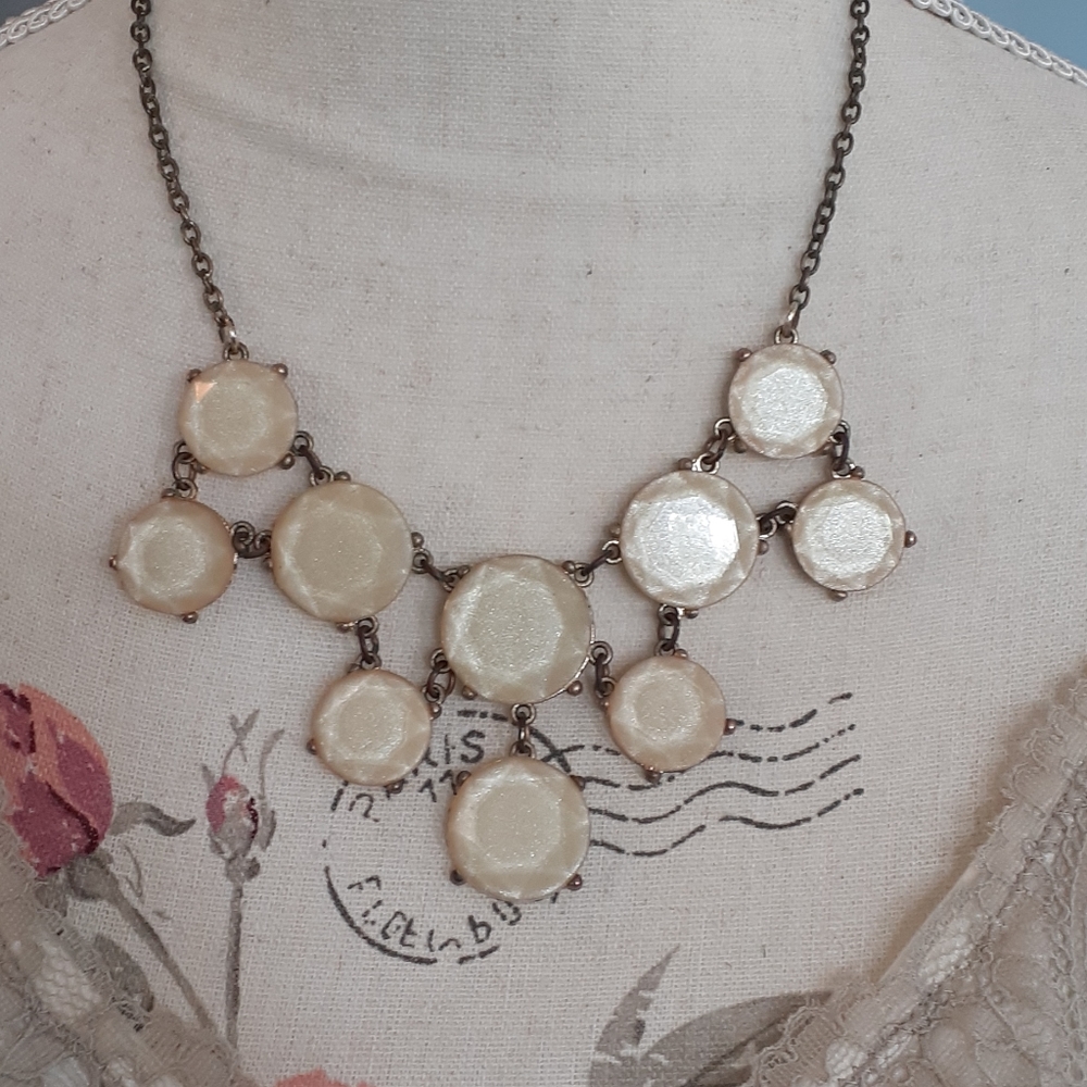 # Sparkly cream tiered statement necklace